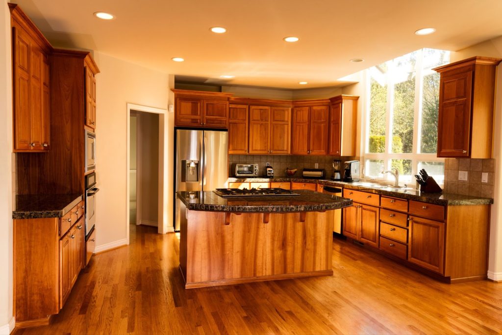 Kitchen cabinets with a beautiful staining finish in a modern kitchen