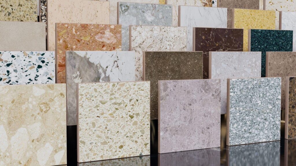 A display of various marble and granite samples showcasing a range of colors and textures