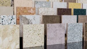 A display of various marble and granite samples showcasing a range of colors and textures