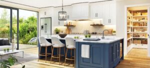 A modern kitchen featuring blue and white cabinets complemented by a stylish bar area