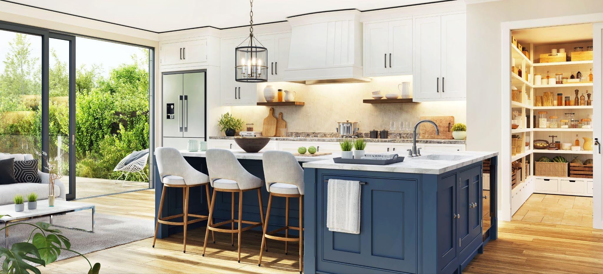A modern kitchen featuring blue and white cabinets complemented by a stylish bar area